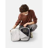 Matador 18L personal item travel pack in black with compact, lightweight design and multiple compartments for organization.