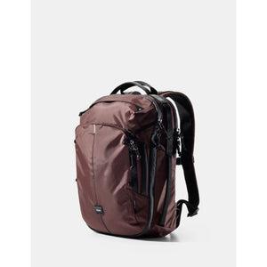 Matador 18L personal item travel pack in garnet color, compact and lightweight with multiple compartments for organized travel.