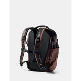 Matador 18L personal item travel pack in garnet color with compact design and multiple compartments for organized travel.