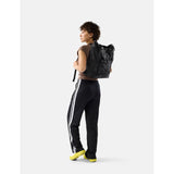 Matador 24L Tote Pack in black with sturdy handles, compact design, and durable material for everyday carry and travel.
