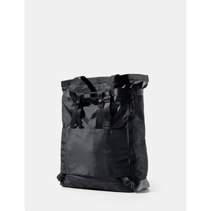 Black Matador 24L Tote Pack featuring durable fabric, spacious design, and adjustable straps for versatile carrying.