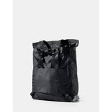 Black Matador 24L Tote Pack featuring durable fabric, spacious design, and adjustable straps for versatile carrying.