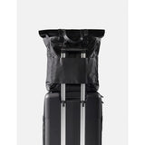 Matador 24L Tote Pack in black, showing durable nylon material, compact design, and sturdy handles for versatile carrying.
