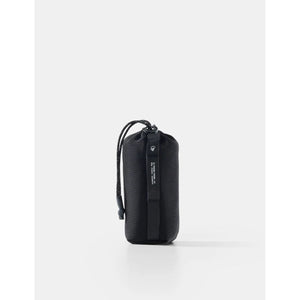 Matador ultralight travel towel in large size, shown folded and spread out, made of quick-drying, compact fabric for outdoor use.