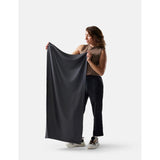 Matador ultralight travel towel in large size, soft and quick-drying fabric, shown folded on a neutral background.