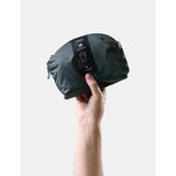 Matador 18L packable backpack in juniper green, lightweight and foldable for outdoor and travel use.