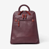 Osgoode Marley organizer backpack in mulberry color, showing front view with multiple compartments and adjustable straps.