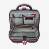 Osgoode Marley organizer backpack in mulberry with interior compartments for organization and storage.