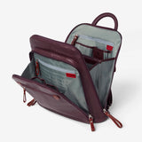 Osgoode Marley organizer backpack in mulberry color with multiple compartments, side view showing adjustable straps and stylish design.
