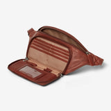 Osgoode Marley RFID organizer waistpack with multiple compartments, side view showing durable fabric and secure zipper closures.