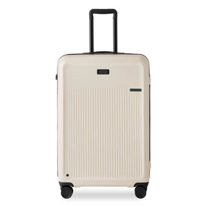 Briggs & Riley Sympatico large expandable checked luggage spinner with front view, hard shell, and multiple wheels for easy travel.