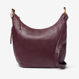 Osgoode Marley Tammi Hobo handbag in mulberry color with front design, showing its stylish and spacious leather shoulder bag.