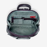 Osgoode Marley teardrop-shaped multi-zip backpack in plum color, showing interior compartments and stylish design.