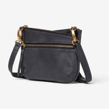 Osgoode Marley Virginia small crossbody bag in storm gray leather with adjustable strap and front zip pocket.