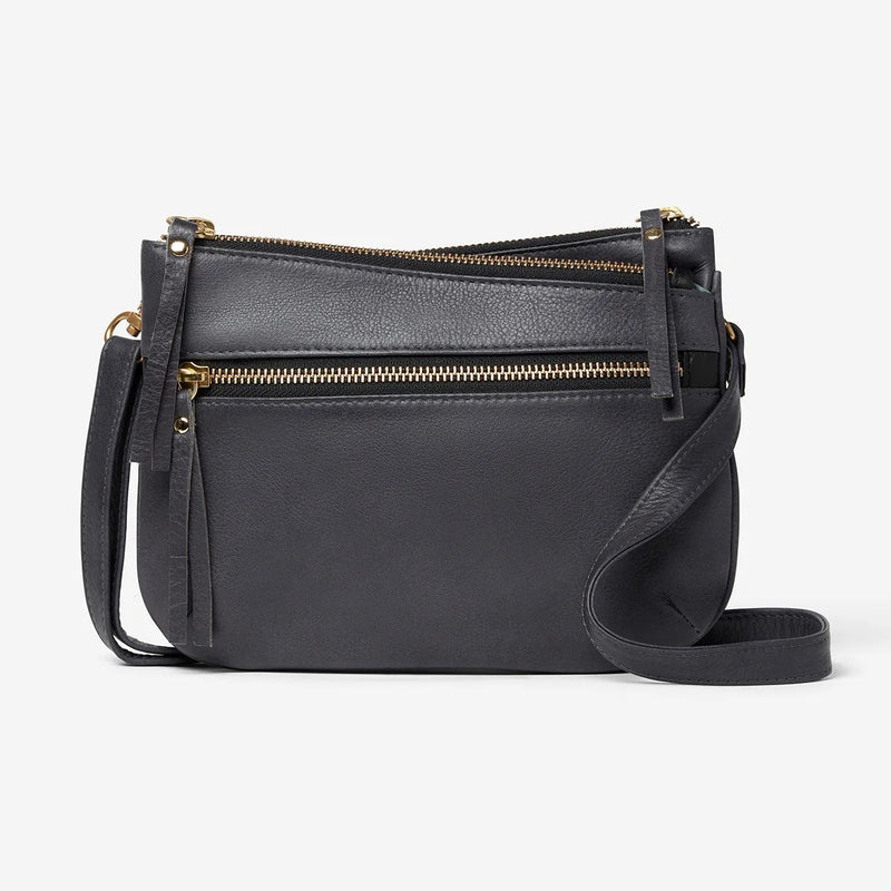 Osgoode Marley Virginia Small Crossbody bag in storm gray, featuring compact design with adjustable strap and front zipper pocket.