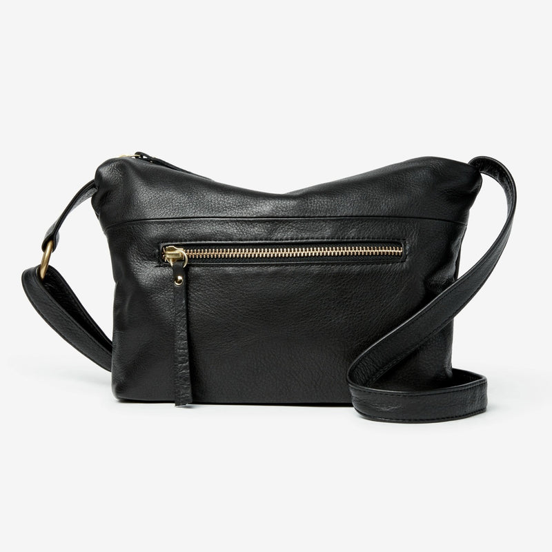 Black Osgoode Marley Zella small crossbody bag with adjustable strap, front pocket, and sleek design.