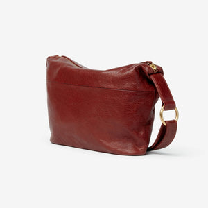 Osgoode Marley Zella small crossbody bag in brown, showing the back view with adjustable strap and compact design.