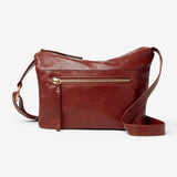 Osgoode Marley Zella small crossbody bag in Brandy color, front view showing compact design and adjustable strap