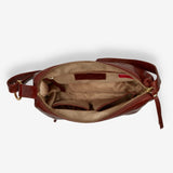 Osgoode Marley Zella small crossbody bag with interior compartments and adjustable strap, designed for everyday use.