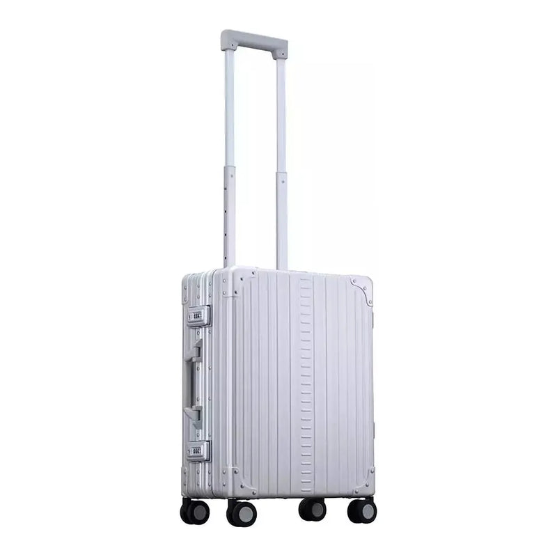 Silver Aleon 21-inch aluminum international carry-on suitcase with sleek design and durable construction.