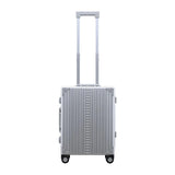 Silver Aleon 21-inch aluminum international carry-on suitcase with four spinner wheels and a sleek, durable design.
