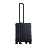 Silver Aleon 21-inch aluminum international carry-on suitcase with durable hard shell and telescoping handle.