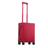 Silver Aleon 21-inch aluminum international carry-on suitcase with a sleek, durable design and integrated handle.