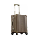 Silver Aleon 21-inch classic carry-on suitcase with hard shell and retractable handle, front zip pocket, and four spinner wheels.