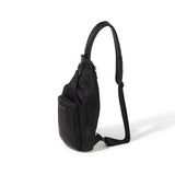 Baggallini Central Park Sling with adjustable strap, multiple compartments, and sleek black fabric for versatile everyday use.