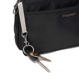 Black Baggallini Perry Crossbody bag with adjustable strap and multiple compartments, made from durable twill fabric.