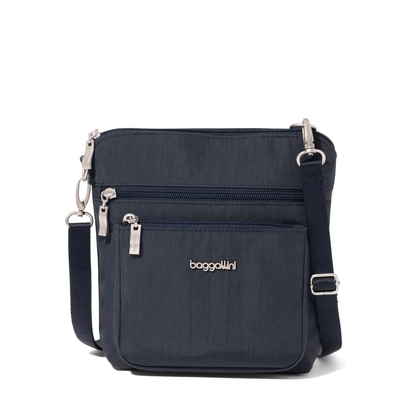 Baggallini Modern Pocket Crossbody bag in French Navy with multiple compartments and adjustable strap for everyday use.
