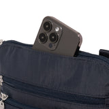 Navy Baggallini Modern Pocket Crossbody bag with multiple compartments and adjustable strap, designed for everyday use.