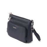 Baggallini Securtex anti-theft keepsake crossbody bag in French navy with secure zipper and compact design.