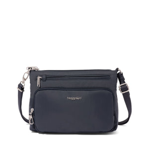 Baggallini Securtex anti-theft keepsake crossbody bag in French navy with secure zipper and sleek design.