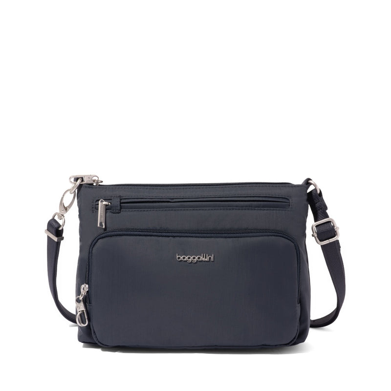 Baggallini Securtex anti-theft keepsake crossbody bag in French navy with secure zipper and sleek design.