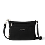 Baggallini Securtex anti-theft keepsake crossbody bag in French navy with secure zipper and compact design.