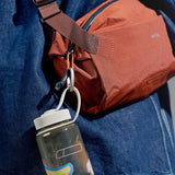 Bellroy Carabiner Trio accessories in black, graphite, and silver, featuring three durable metal carabiners for versatile use.