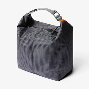 Gray Bellroy Lite Cooler Caddy 10L with insulated interior, portable carry handle, and compact design for easy cooling on the go.