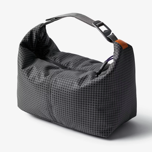 Bellroy Lite Cooler Caddy in gray, compact 6L insulated cooler bag with carry handle for on-the-go food and beverage storage.