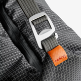 Bellroy Lite Cooler Caddy 6L in gray, compact insulated cooler bag with carrying handle for snacks and drinks.
