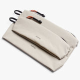 Bellroy Lite Pouch Duo with two compact, stylish pouches in black and gray, perfect for organizing essentials.