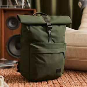 Bellroy Classic Rolltop backpack with sleek design, rolltop closure, and adjustable straps, shown in a side view.