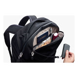 Black Bellroy Lite Travel Pack backpack with multiple compartments and padded straps, designed for 30L travel storage.