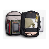 Black Bellroy Lite Travel Pack backpack with 30L capacity, featuring multiple compartments and padded shoulder straps.