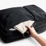 Bellroy Lite Travel Pack 38L backpack with sleek black design, multiple compartments, and comfortable shoulder straps.
