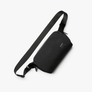 Bellroy Classic Sling 3L in black, showing the compact, stylish crossbody bag with adjustable strap and sleek design.