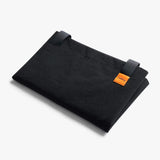 Bellroy Market Tote 15L in durable fabric with leather handles, showing a spacious, stylish shopping bag on a neutral background.