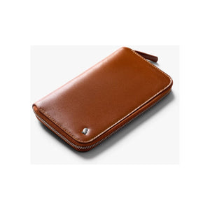 Bellroy Travel Folio 2nd Edition opened to show organized slots for passports, cards, and travel documents.