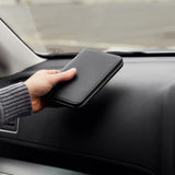 Bellroy Travel Folio (2nd Edition) with leather exterior, open showing various compartments for travel documents and cards.
