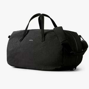 Bellroy Venture Duffel 55L in black, showing the spacious design with durable fabric and adjustable shoulder straps.